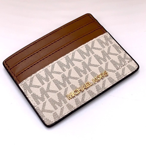 MICHAEL KORS
Leather Large Card Holder Case Wallet
Brown signature color - Picture 3 of 10